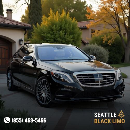 Professional chauffeur-driven luxury sedan for corporate travel in Seattle