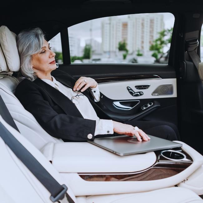 Professional chauffeur-driven luxury sedan for corporate travel in Seattle
