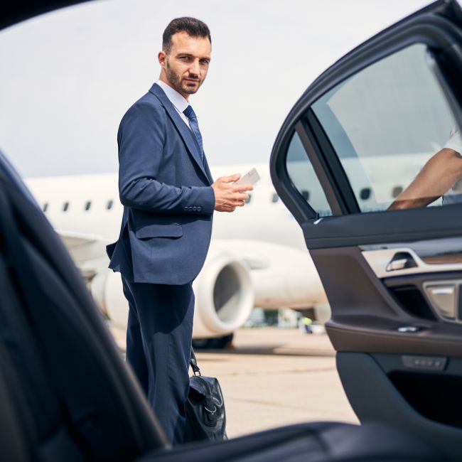 Professional chauffeur-driven luxury sedan for corporate travel in Seattle