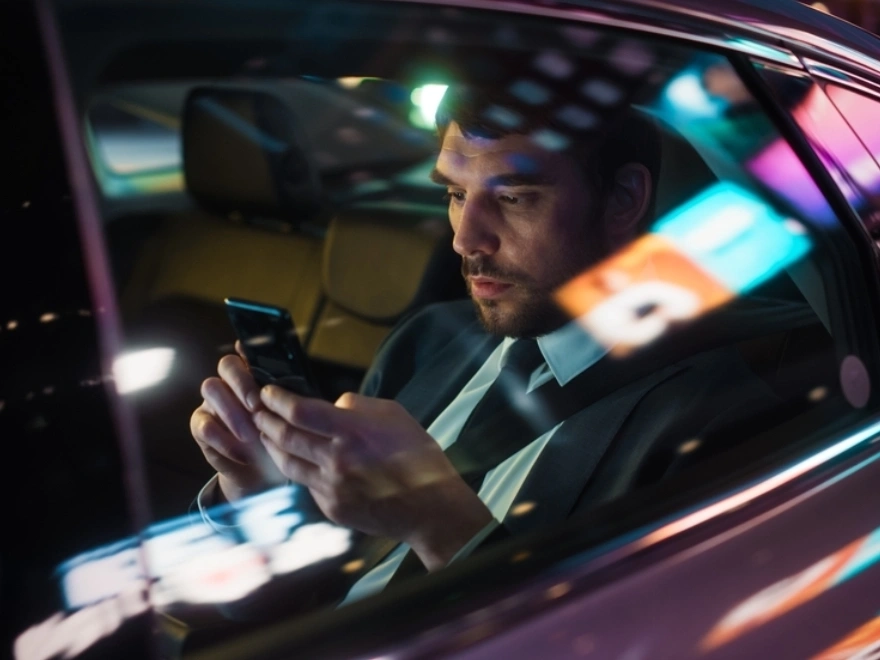 Professional chauffeur-driven luxury sedan for corporate travel in Seattle